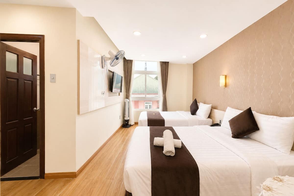 Family Room, City View | Laptop workspace, blackout drapes, soundproofing, free WiFi