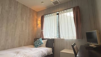 Standard Single Room | Iron/ironing board (on request), WiFi (free)