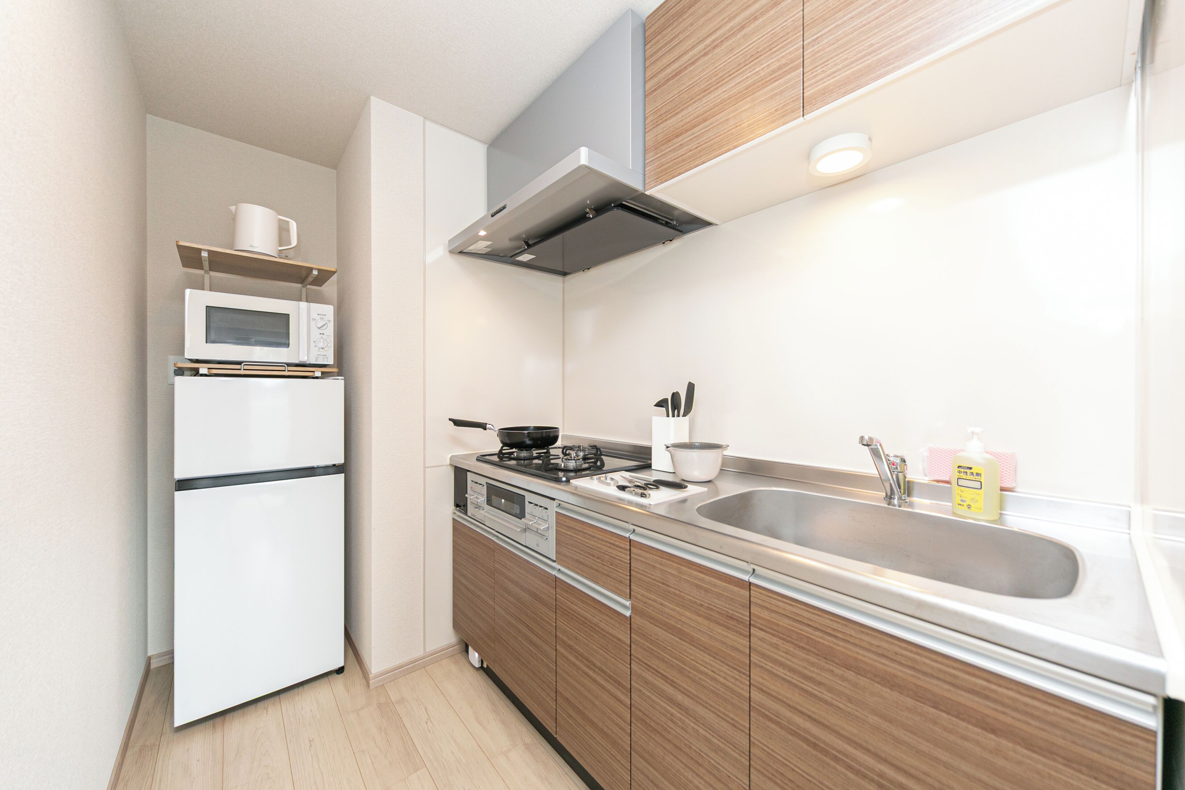 Family Room | Private kitchen | Full-size fridge, microwave, stovetop, cookware/dishes/utensils