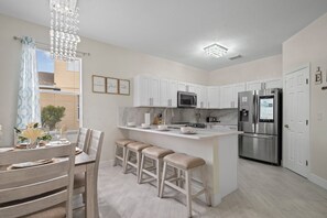 Fridge, microwave, oven, stovetop - SOUTH-FACING POOL, SPA, THEATER, GAMEROOM NEAR DISNEY (Haines City)
