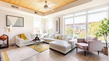 Condo, 1 Bedroom, Smoking, Balcony | Living area | Books