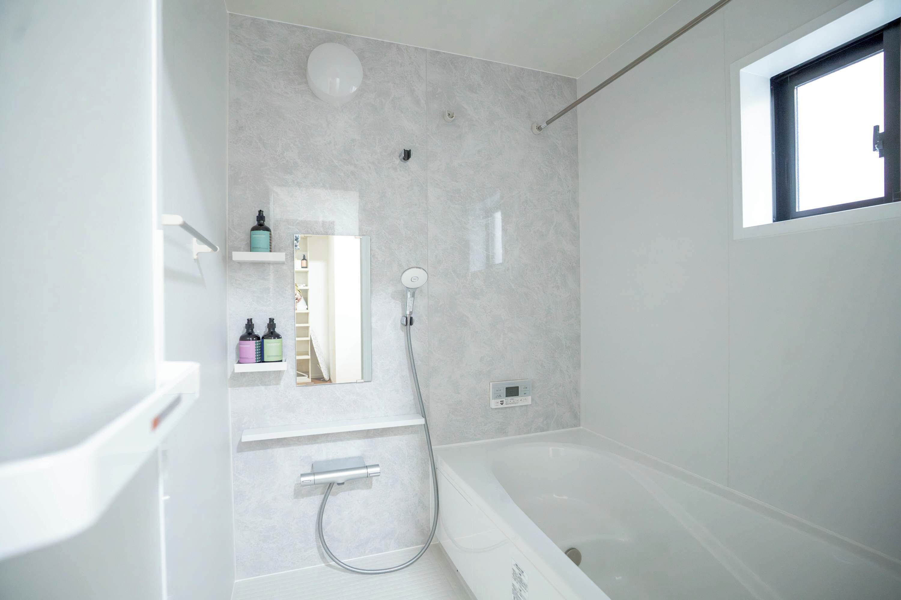 Shower, hair dryer, towels, shampoo