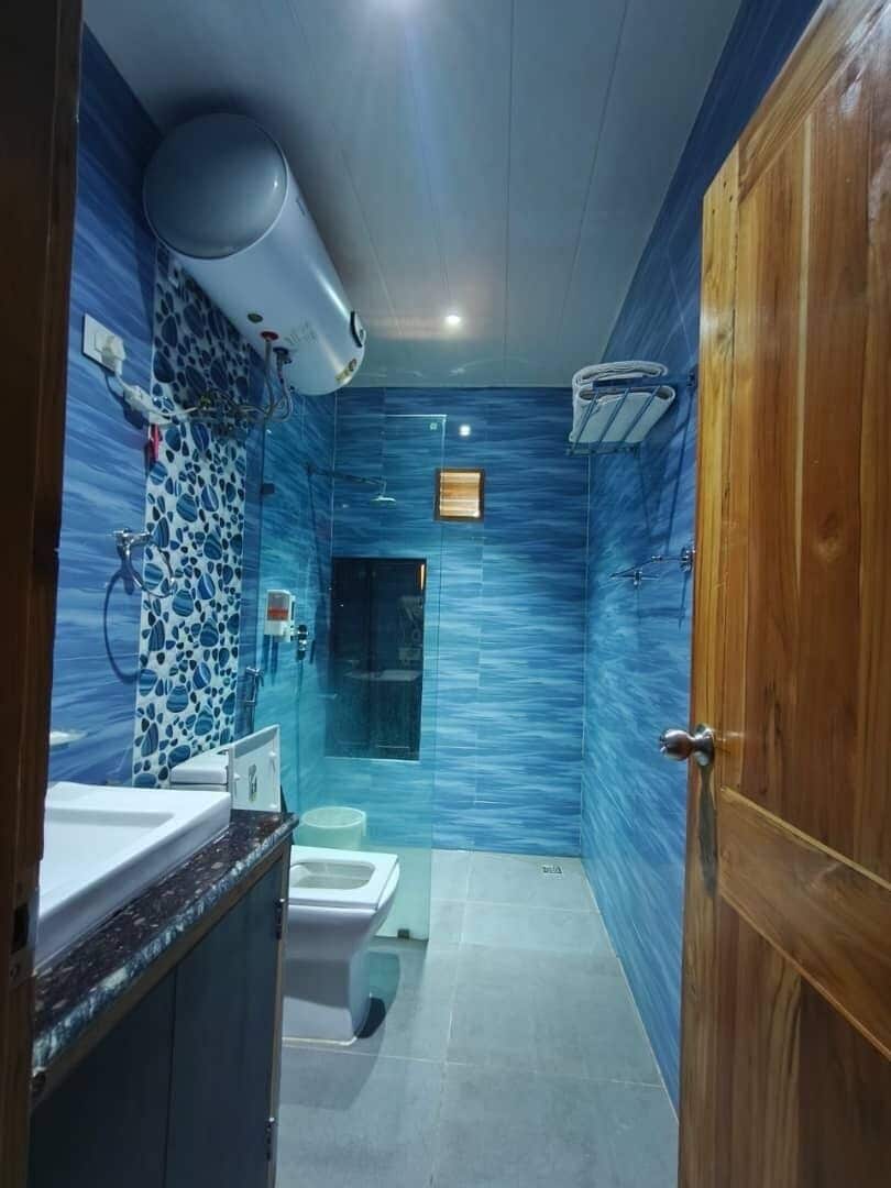Hair dryer, towels, soap, shampoo