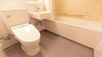 Separate bathtub and shower, towels, shampoo, toilet paper
