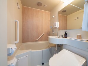 Bañera con ducha, artículos de tocador gratuitos, secador de pelo