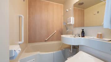 Combined shower/tub, free toiletries, hair dryer, slippers
