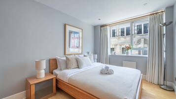 1 bedroom, desk, iron/ironing board, travel cot