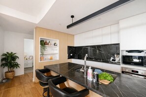 Fridge, microwave, oven, stovetop - Designer 2 Bedroom Apartment in South Brisbane (South Brisbane)