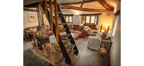 Cozy Eco barn conversion with a boho feel, surrounded by Edens beauty .
