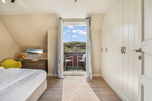 3 bedrooms, WiFi, bed sheets - Modern vacation home with 3 bedrooms with terrace, beach chair and fireplace - (Hörnum (Sylt))