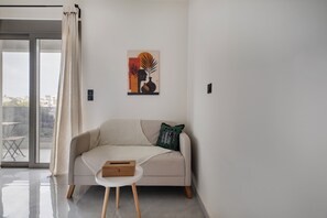 Studio, 1 Double Bed, Kitchenette, City View | Living area | 50-inch Smart TV with digital channels, Netflix, streaming services - Oraya Chic Studio with Balcony in Athens (Athens)