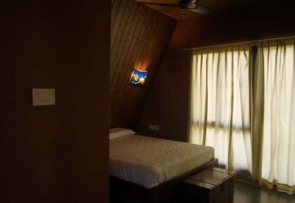 Huvila, parveke, näköala puutarhaan