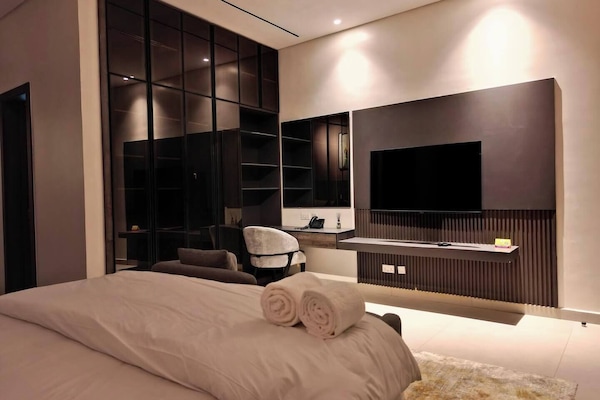 Family Apartment, Balcony, City View | In-room safe, desk, laptop workspace, blackout drapes