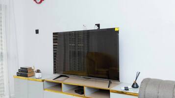 FamiljelÀgenhet - balkong - utsikt mot staden | Vardagsrum