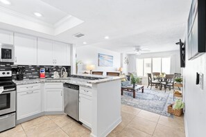 Fridge, microwave, oven, stovetop - Enjoy stunning ocean views from the balcony, living room, dining area, and kitchen. This 2BR condo features a heated beachfront pool, fitness room, king beds in both bedrooms, and comfortably sleeps 4 in beautiful Daytona Shores. (Daytona Shores)