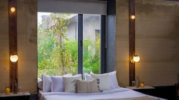 Deluxe villa, uitzicht op tuin | Een strijkplank/strijkijzer, gratis wifi