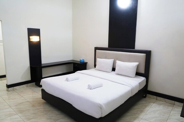 Habitación superior con 1 cama doble o 2 individuales