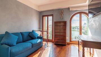 Appartement Duplex, vue fleuve | Coin séjour