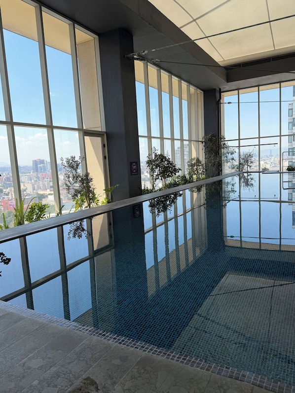 Pool - Stylish 2BR/2BA apartment in Vivant Mitikah with luxury finishes and top amenities: pool, gym, business center & more. Located inside Mitikah Mall with shops, restaurants, and Walmart downstairs—everything you need in one place. 24/7 security. (CDMX)