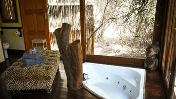 Suite Luxe, patio, vue jardin | Intérieur