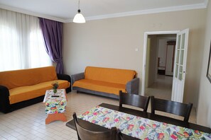 Comfort-værelse med 2 enkeltsenge - balkon - udsigt til have | Opholdsområde