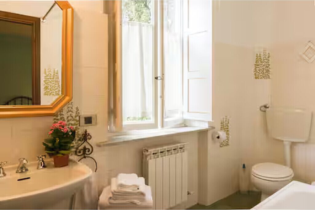 Ducha, secador de pelo, bidet, toallas