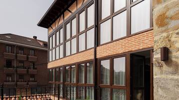 Suite familiar, vistas al jardín | Restaurante al aire libre