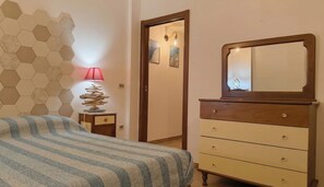 2 dormitorios, tabla de planchar con plancha, wifi gratis y ropa de cama