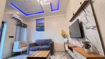 Economy Apartment, Balcony, City View | Living area