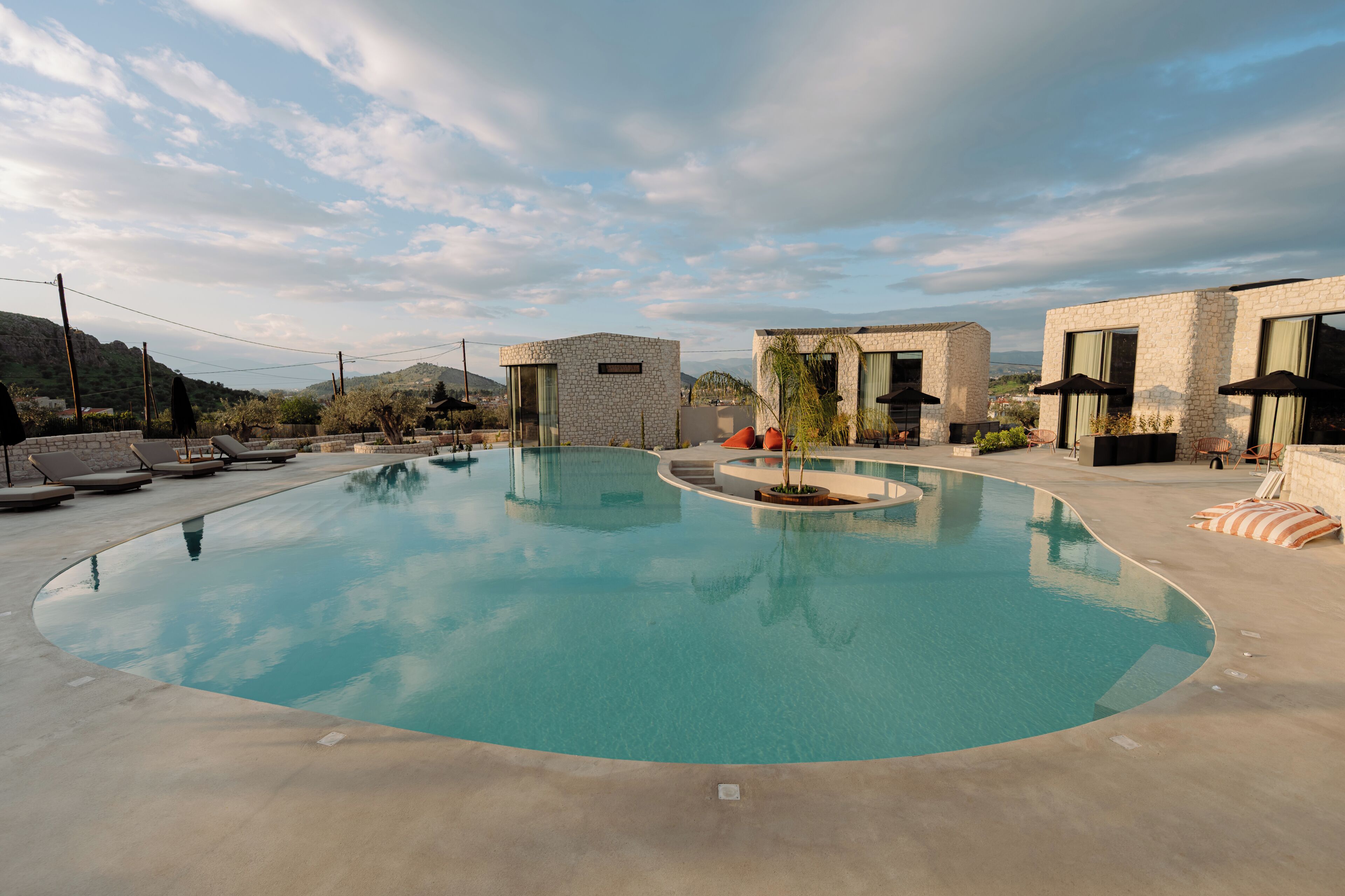 Seasonal outdoor pool, pool umbrellas, pool loungers