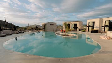 Seasonal outdoor pool, pool umbrellas, pool loungers