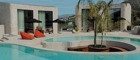 Seasonal outdoor pool, pool umbrellas, sun loungers