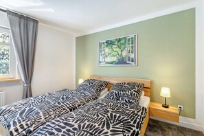 2 chambres, fer et planche à repasser, Wi-Fi, draps fournis