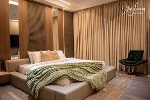 Apartamento, 1 habitación, patio | Minibar, caja fuerte, tabla de planchar con plancha y wifi gratis
