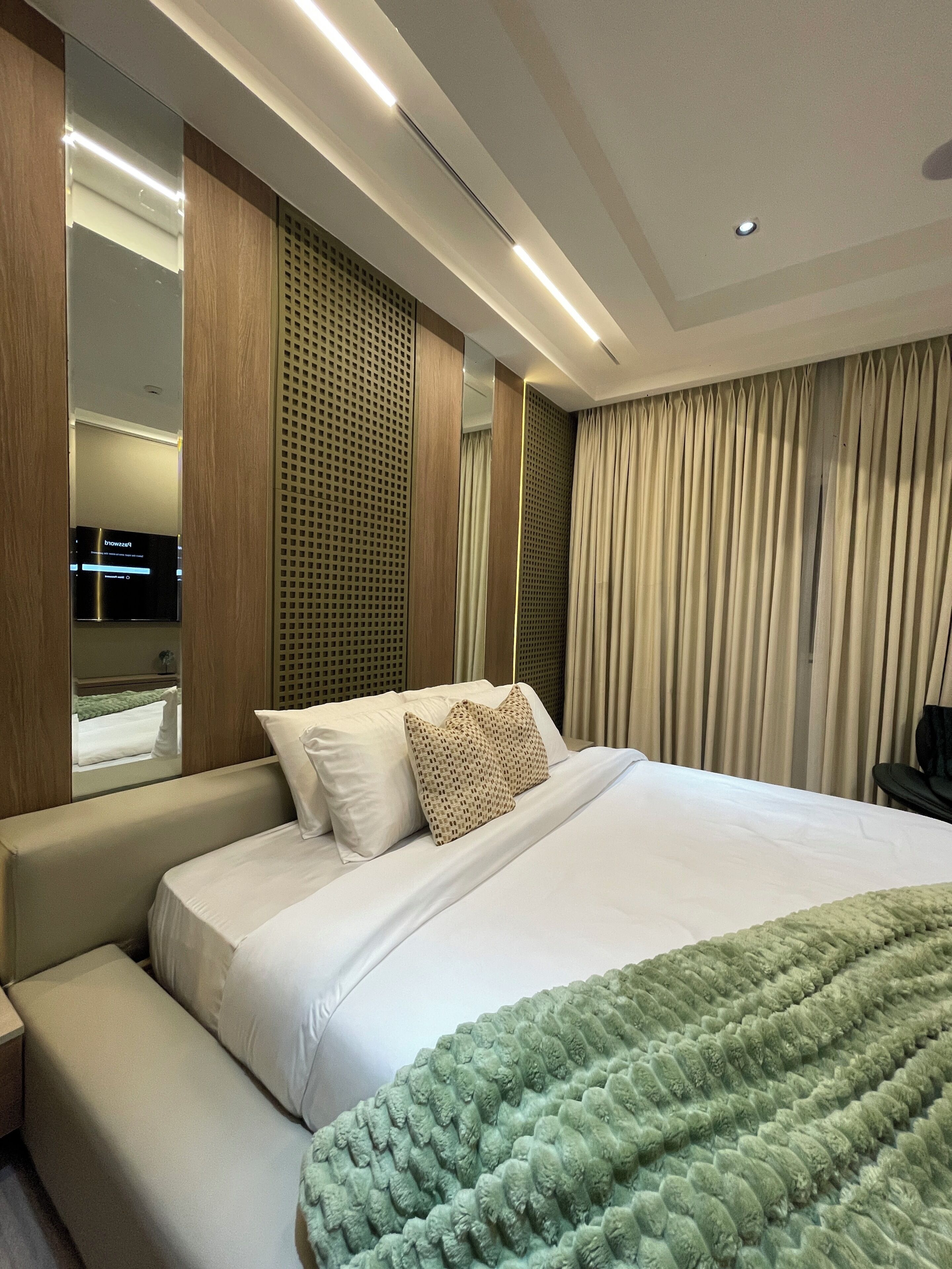 Apartamento, 1 quarto, varanda | Frigobar, cofres nos quartos, ferros/tábuas de passar roupa