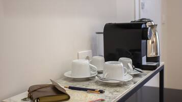 Chambre Triple Junior, vue ville | Café et/ou machine à café