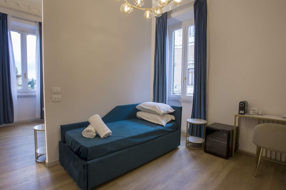 Luxury Quadruple Room, City View