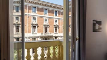 Deluxe Double Room, City View | Minibar, in-room safe, desk, blackout drapes