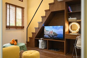 Estúdio superior, varanda, vista para o jardim