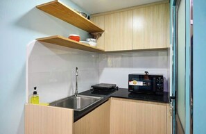 Superior Studio, Patio, Garden View | Private kitchen - MyRoom An Viên - District 1 (Phuong Cau Ong Lanh)