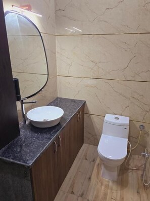 Deluxe Triple Room, Balcony | Bathroom - Hotel Marina (Meerut)