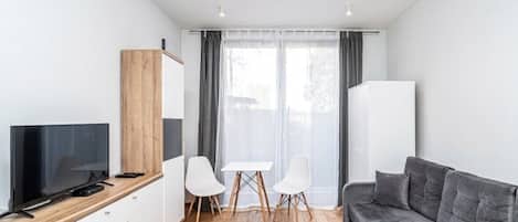 Suite Studio, patio | Coin séjour