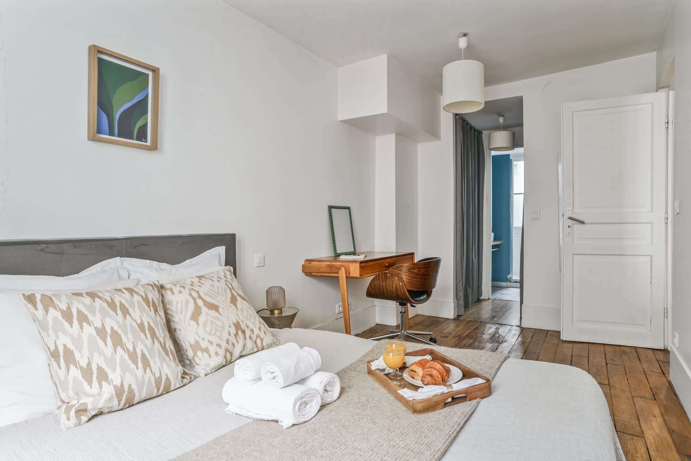 1 bedroom, desk, iron/ironing board, travel crib