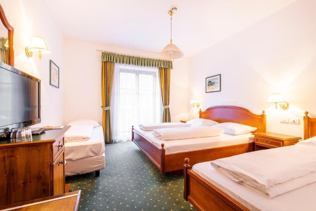 Standard Quadruple Room, Balcony, Garden View