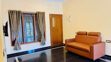 Apartamento Deluxe | Zona de estar
