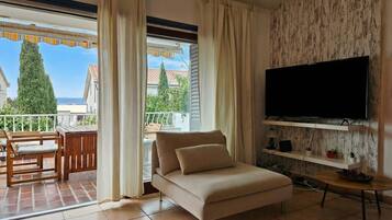 Family Apartment, Multiple Bedrooms, Mountainside (Punta Debij Apartment Nataly) | Living area | 32-inch flat-screen TV with digital channels