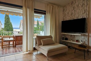 Family Apartment, Multiple Bedrooms, Mountainside (Punta Debij Apartment Nataly) | Living area | 32-inch flat-screen TV with digital channels