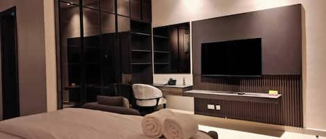 Deluxe Apartment, Balcony, City View | In-room safe, desk, laptop workspace, blackout drapes