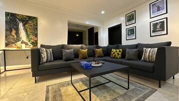 Deluxe Apartment, Balcony, City View | Living area