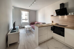 Apartamento, sacada | Cozinha americana privada